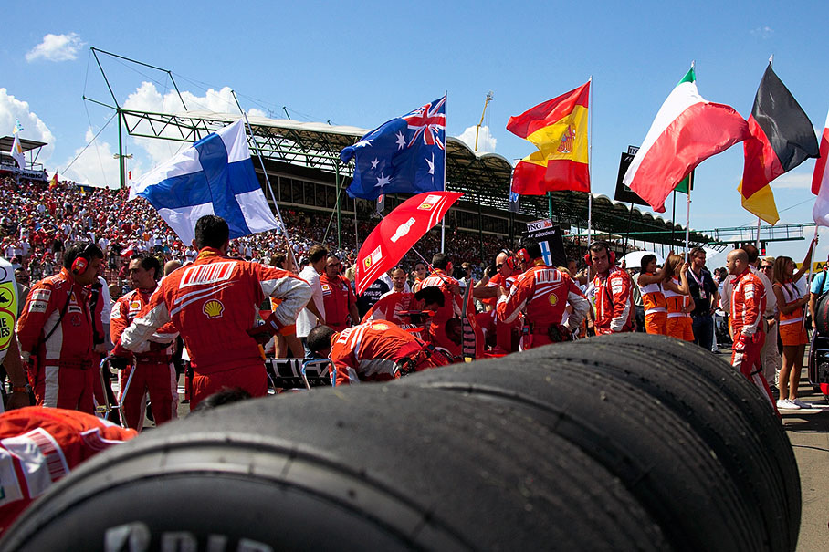 Flags wave above the grid
