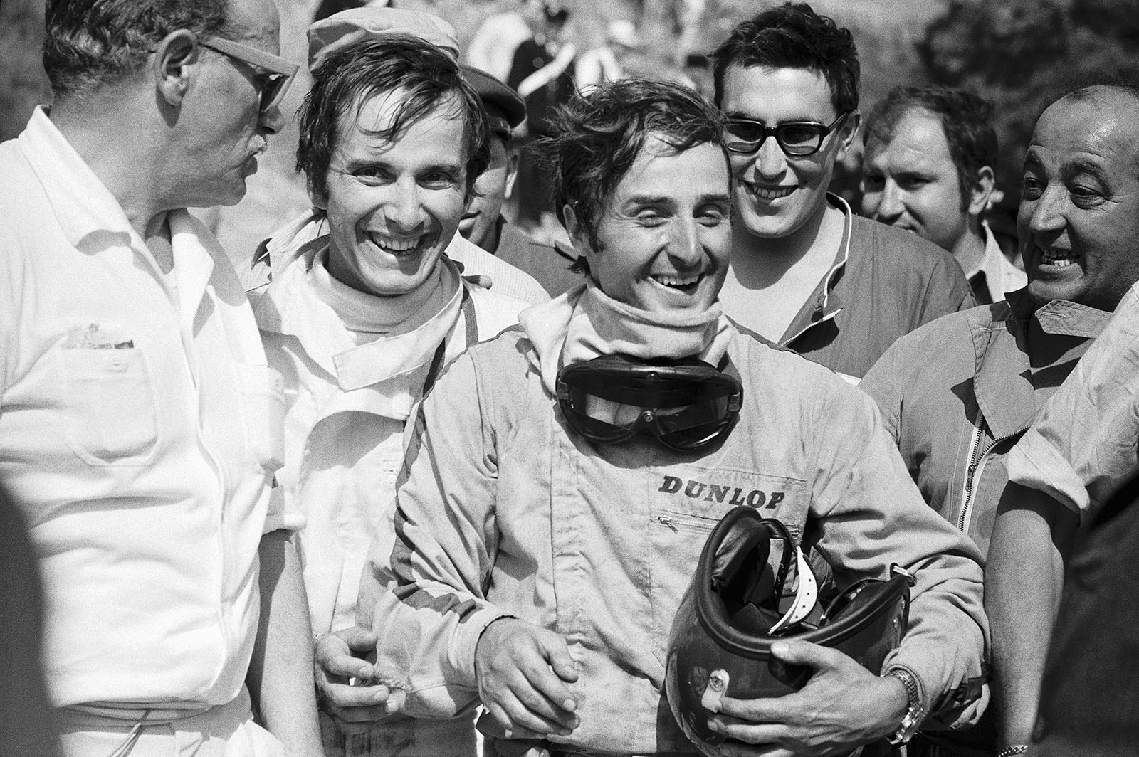 The happy winners of class P2.0 (2nd overall with the Alfa Romeo T33/2 #75033-017) Ignazio Giunti (I) on right hand and Nanni Galli (I) walk to rostrum ceremony after their successful race