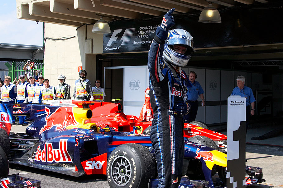 Race winner Sebastian Vettel celebrates his victory and his win of the F1 Constructor's World Championship for the Red Bull Racing Team