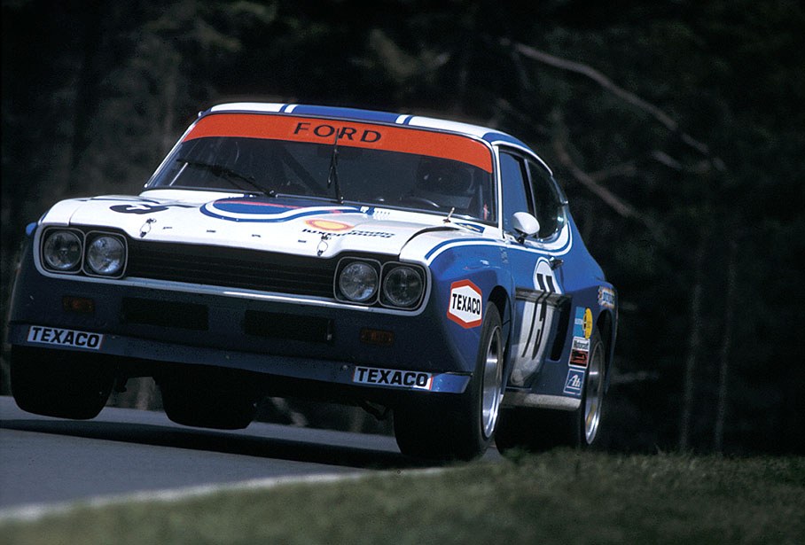 Jochen Mass (D) jumps with the Ford Capri RS