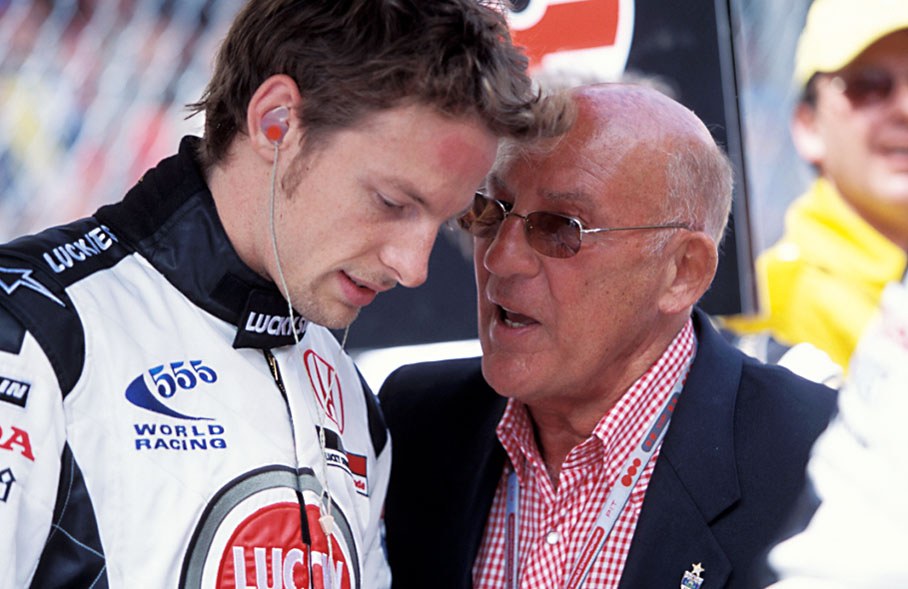 Jenson Button listens carefully to Sir Stirling Moss, three times winner of the Monaco GP