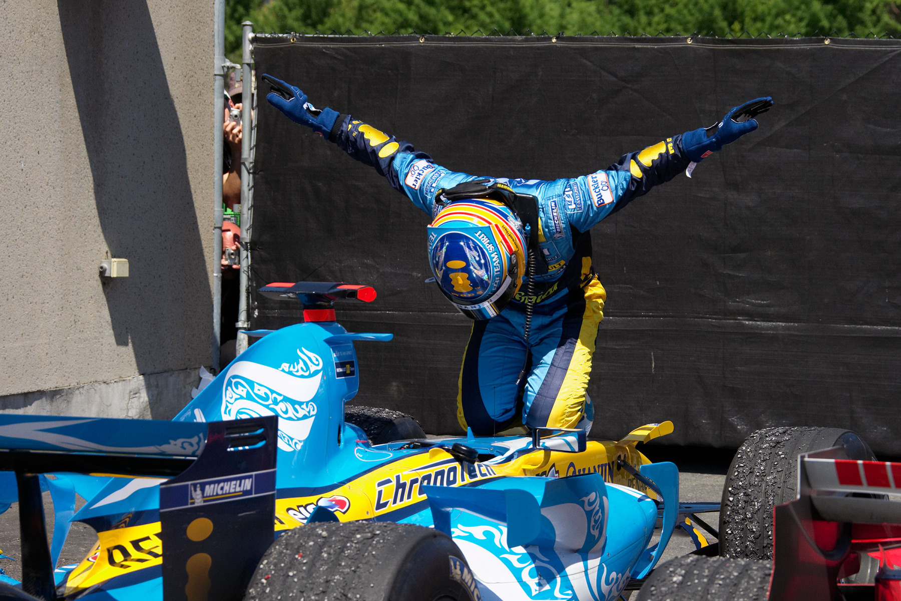 Fernando Alonso executing his profane-religious rites