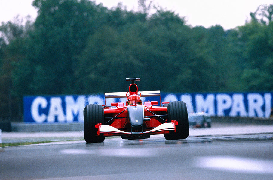 Michael Schumacher with a black-nosed Ferrari, displaying the team's deepest sympathy for the victims of the 9/11 tragedy