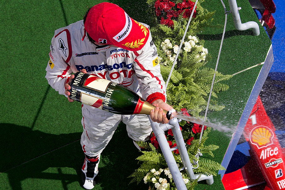 Second placed Timo Glock sprays champagne