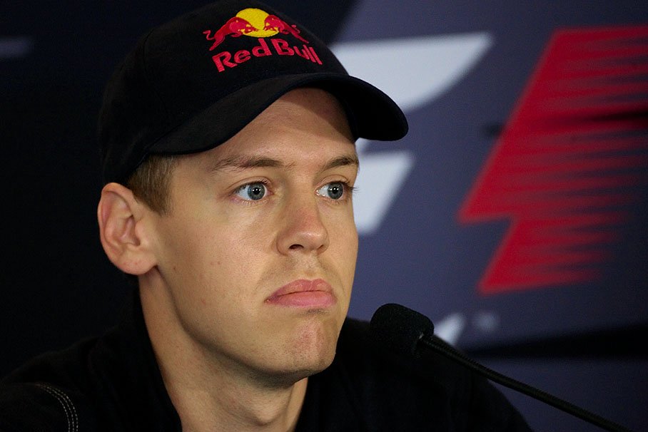 Unlucky Sebastian Vettel under media interrogation
