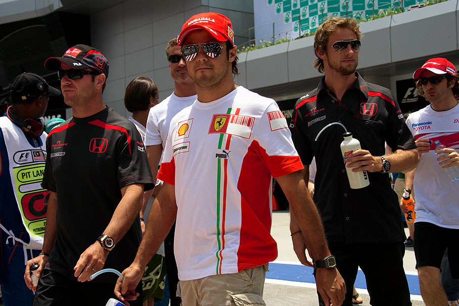 Ferrari's Felipe Massa with both Honda drivers Barrichello and Button
