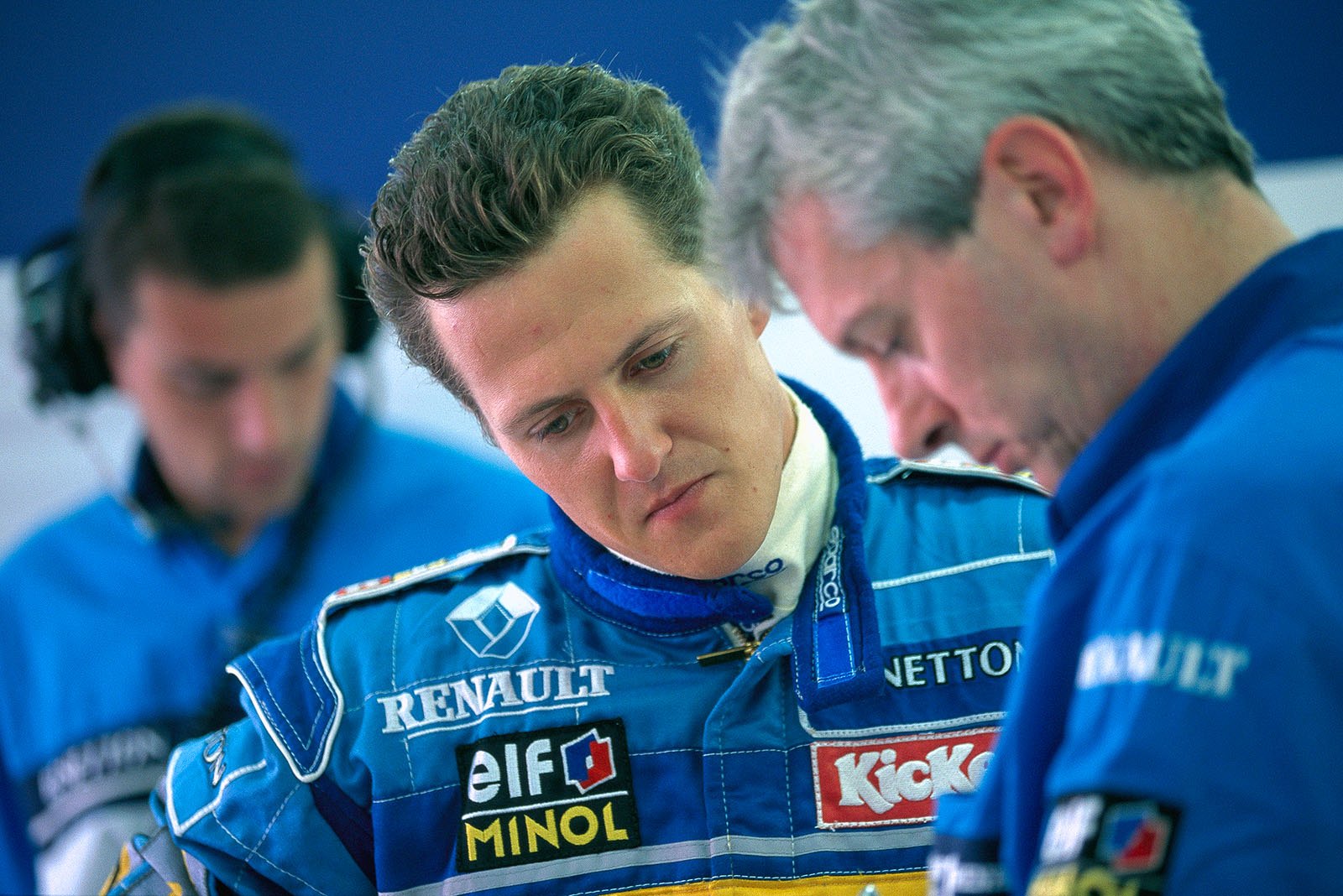 French Grand Prix, 1995: Michael Schumacher, Benetton, talks to his engineer Pat Symonds