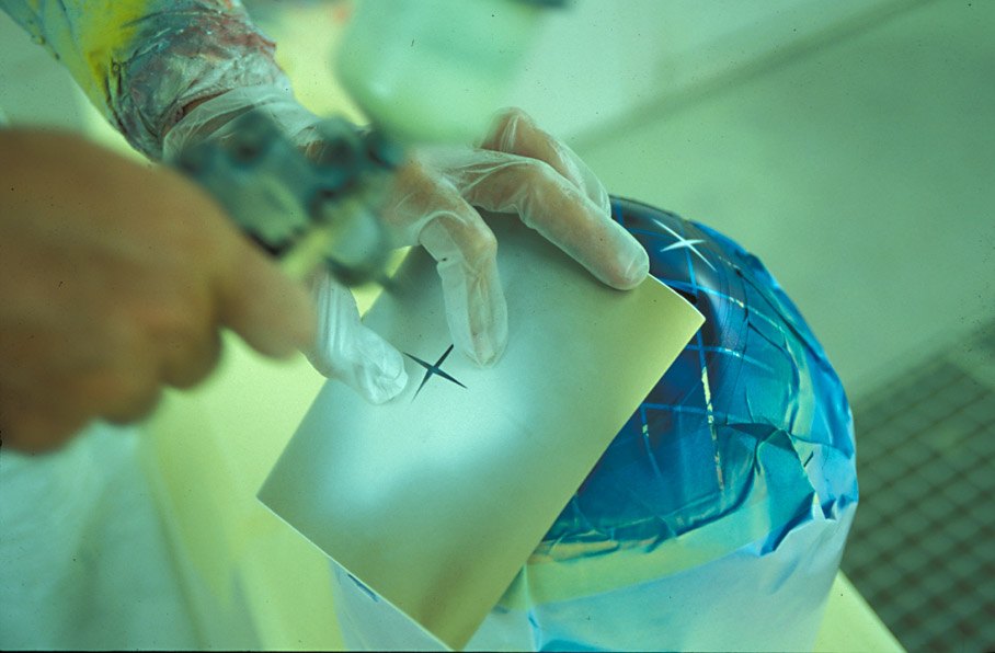 Peter Ginneken of BELL Helmets S.A. making the artwork of the 1998 Suzuka race helmet for Michael Schumacher