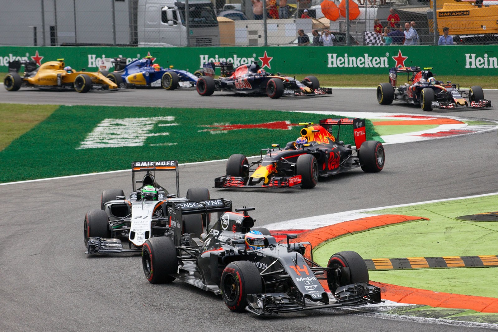 Fernando Alonso, McLaren-Honda in front of Hulkenberg's Force Inda and Verstappen in the second Red Bull, Monza, Italian Grand Prix, 2016