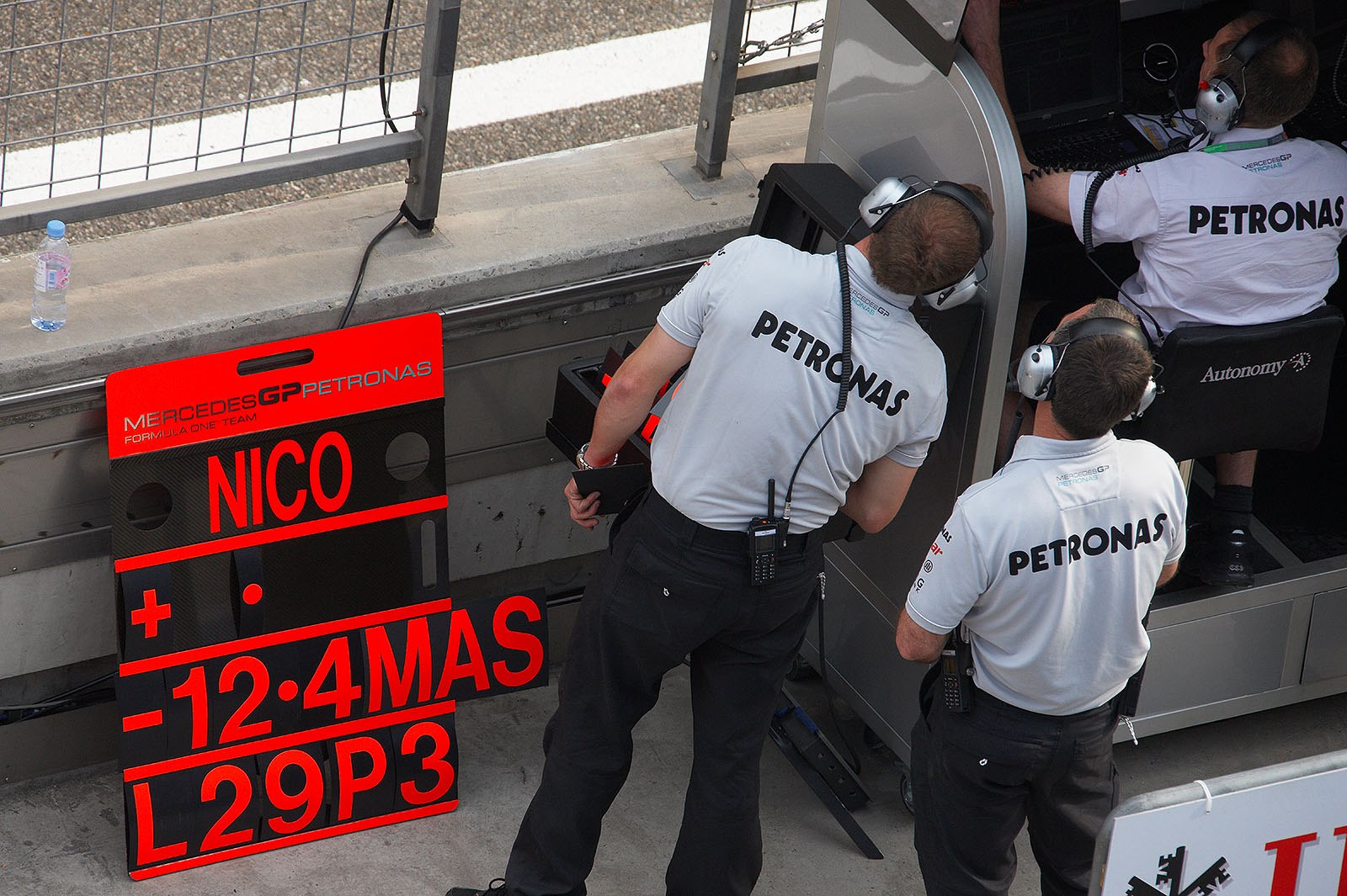 Nico Rosberg's pit board signals third position from Mercedes pit wall command center