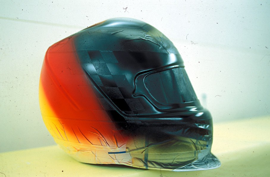 Peter Ginneken of BELL Helmets S.A. making the artwork of the 1998 Suzuka race helmet for Michael Schumacher
