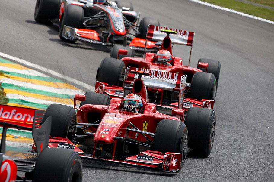 Both Ferrari cars with Fisichella and Raikkonen between the McLarens