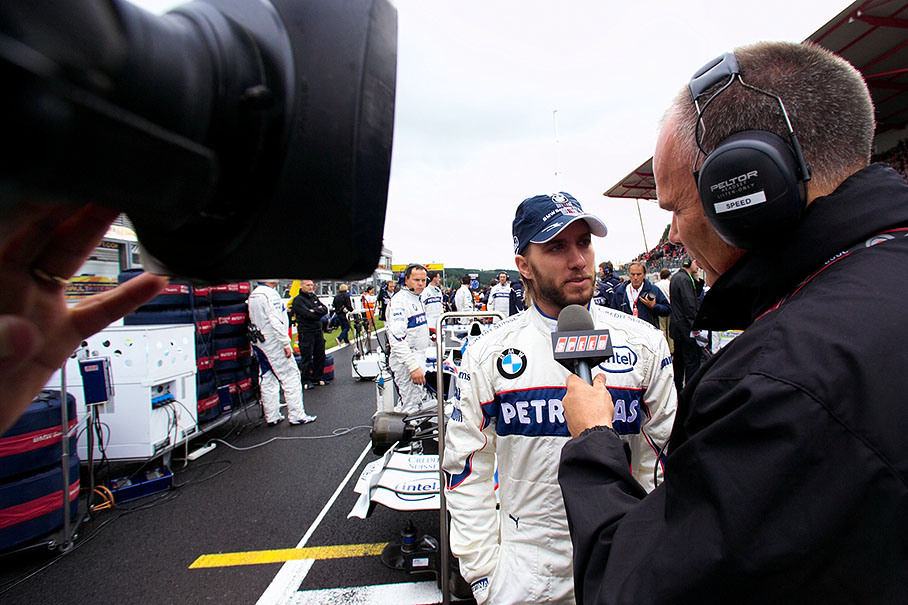 Nick Heidfeld is being interviewed at his grid position by Speed TV presenter Peter Windsor
