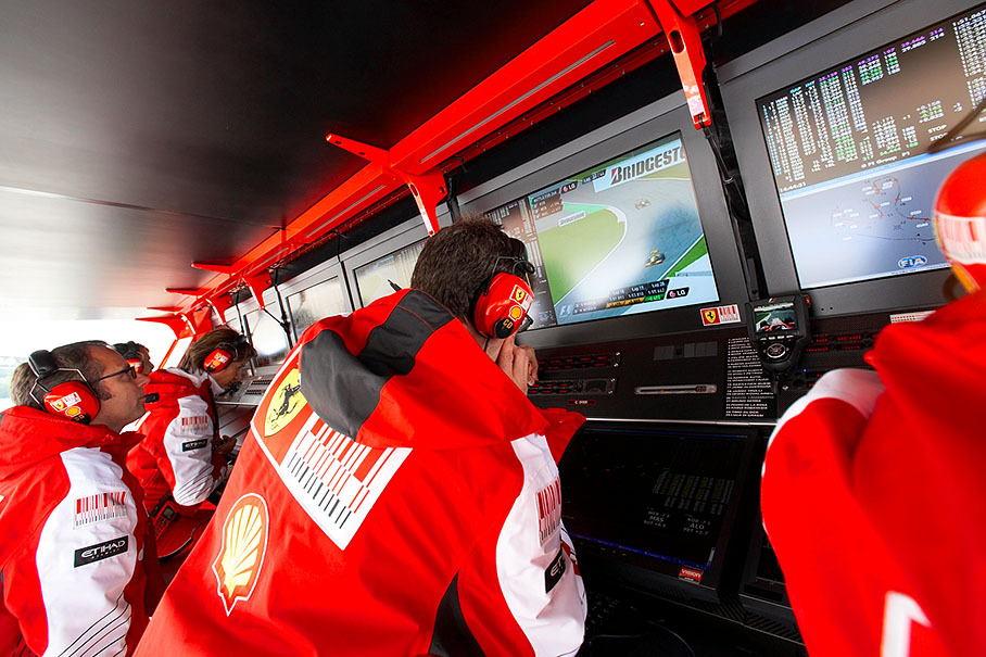 Ferrari's pit wall command center with team boss Stefano Domenicali and chief engineer Chris Dyer