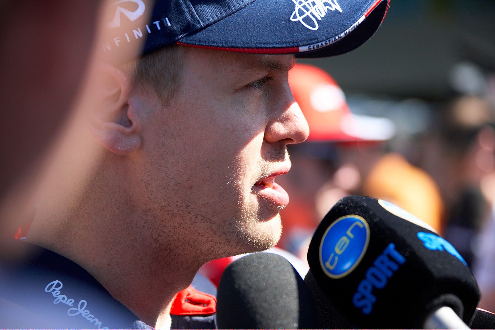 Sebastian Vettel, Red Bull Racing, answers curious questions of the media