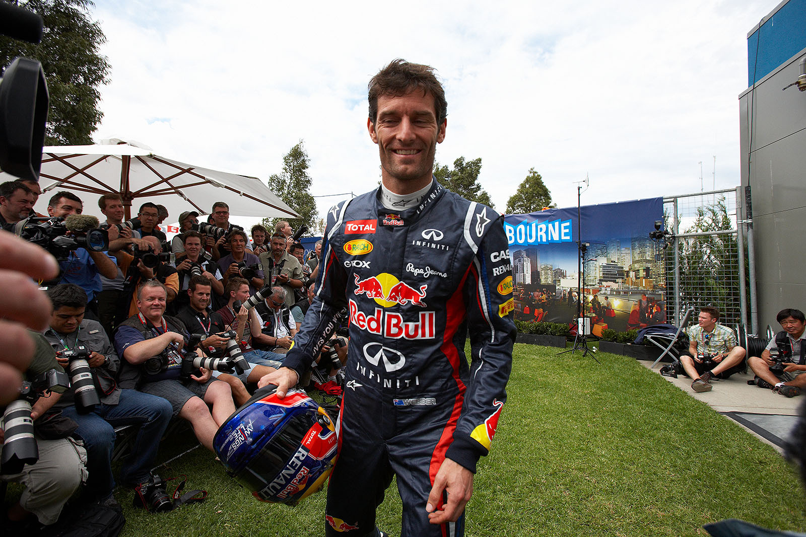 Local hero Mark Webber of Red Bull Racing has finished his posing for the photographers