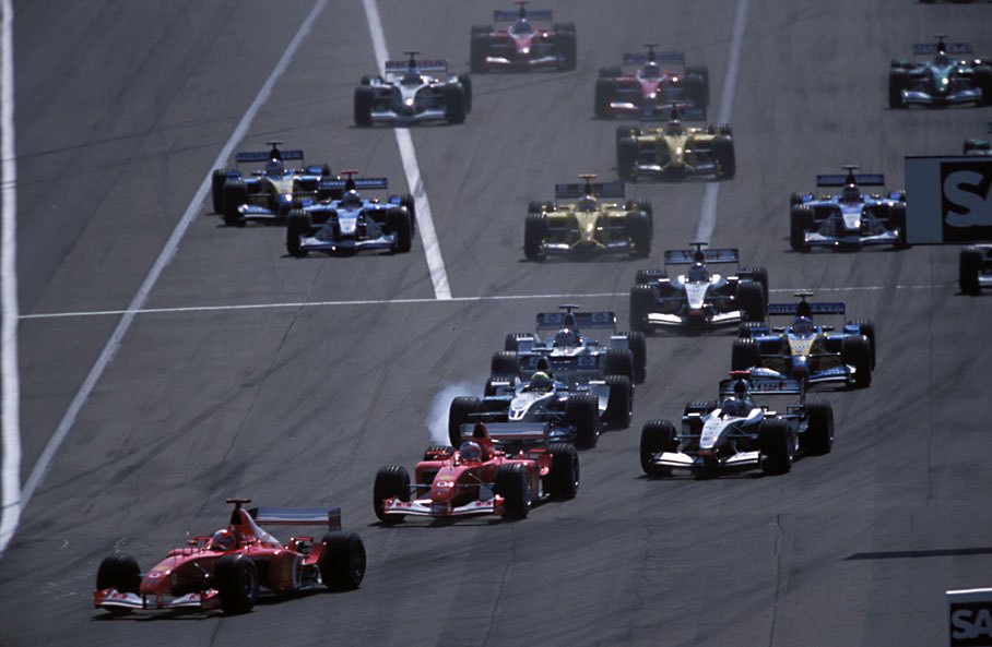 Start, Ralf Schumacher locking up a wheel