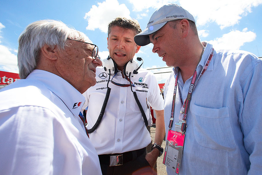 Bernie Ecclestone talks with Mercedes GP CEO Nick Fry and Mercedes guest Mike Lynch