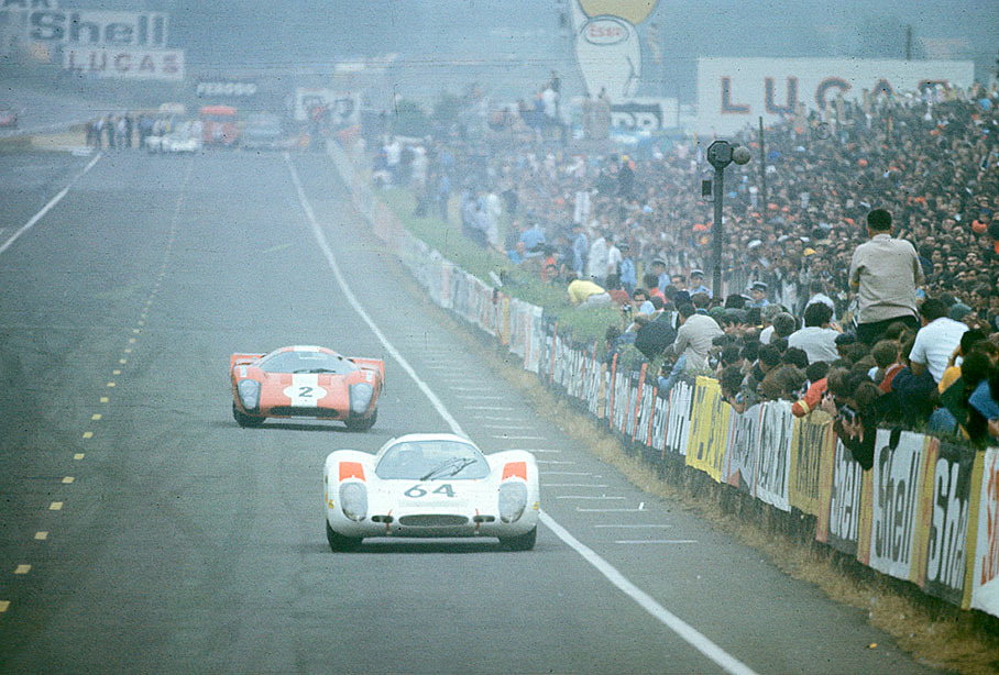 Winning prototype (overall second placed) Porsche P908L 031 #64 driven by Hans Herrmann (D) and Gerard Larrousse (F), in front of Filipinetti's Lola-Chevrolet T70 Mk3B