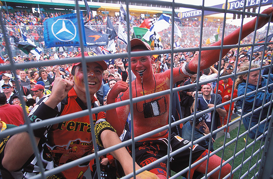 Fans behind the fence