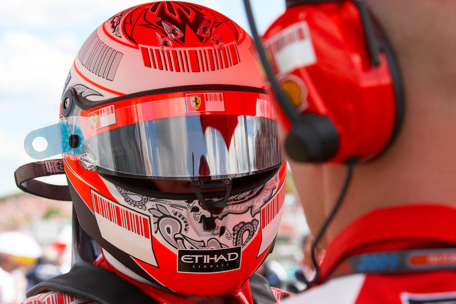 Kimi Raikkonen with his helmet on