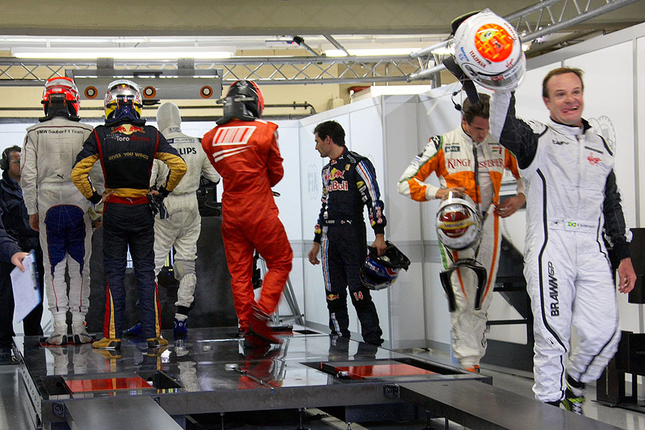 Polesetter and local hero Barrichello jokes around at the scales after qualifying