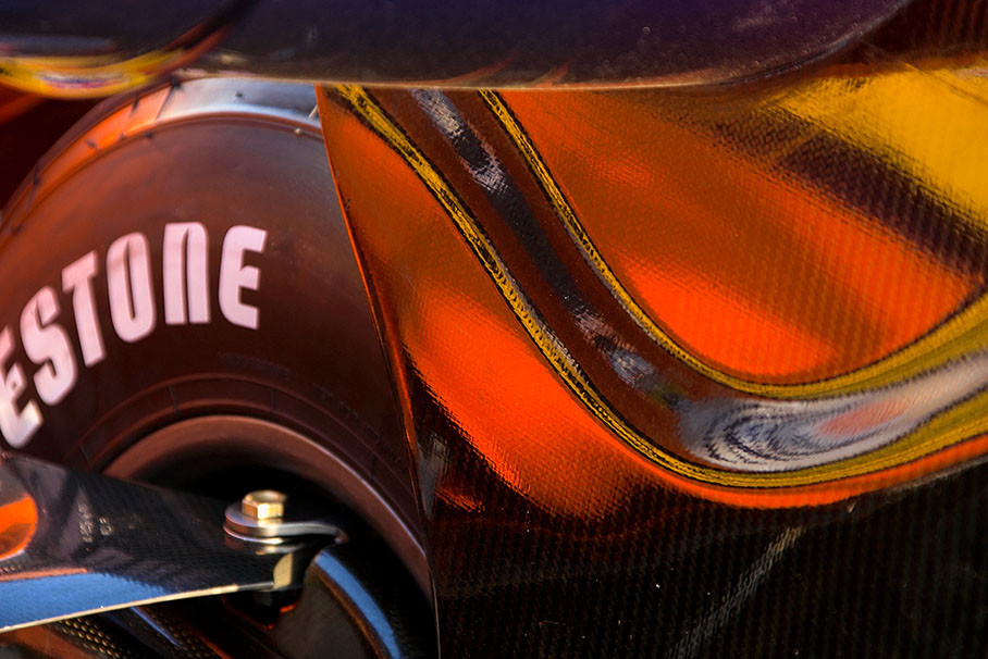 Golden reflections on the inside of a Renault's rear wing construction