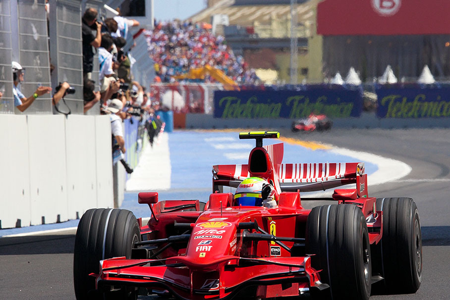Massa celebrates his victory after crossing finish line