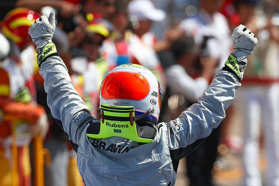 Brawn Grand Prix' race winner Rubens Barrichello celebrates his victory in parc ferme