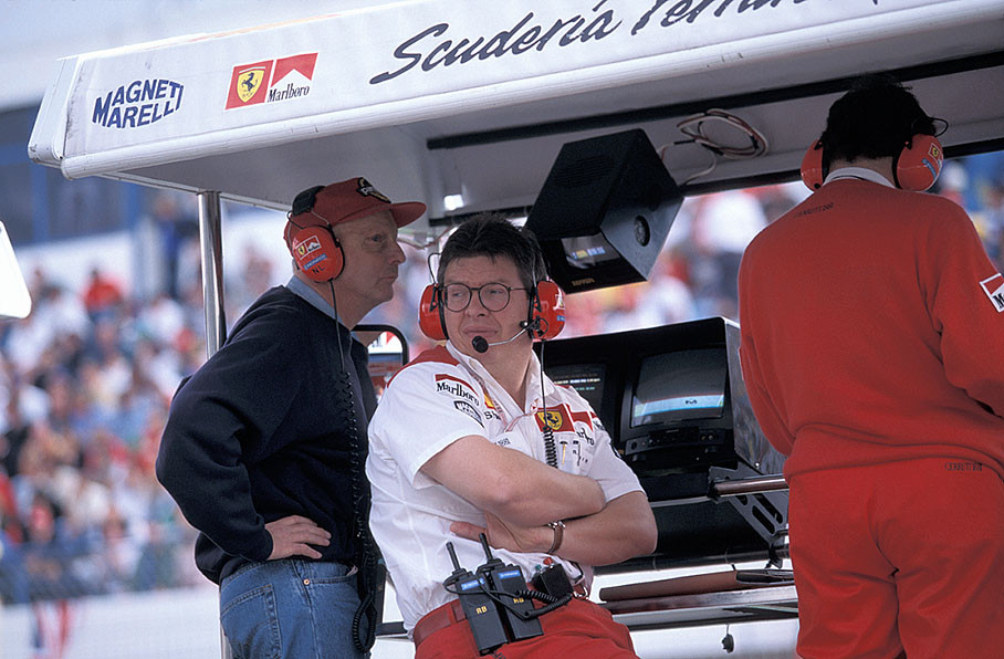 Ferrari's technical director Ross Brawn at the pitwall with Niki Lauda and Jean Todt