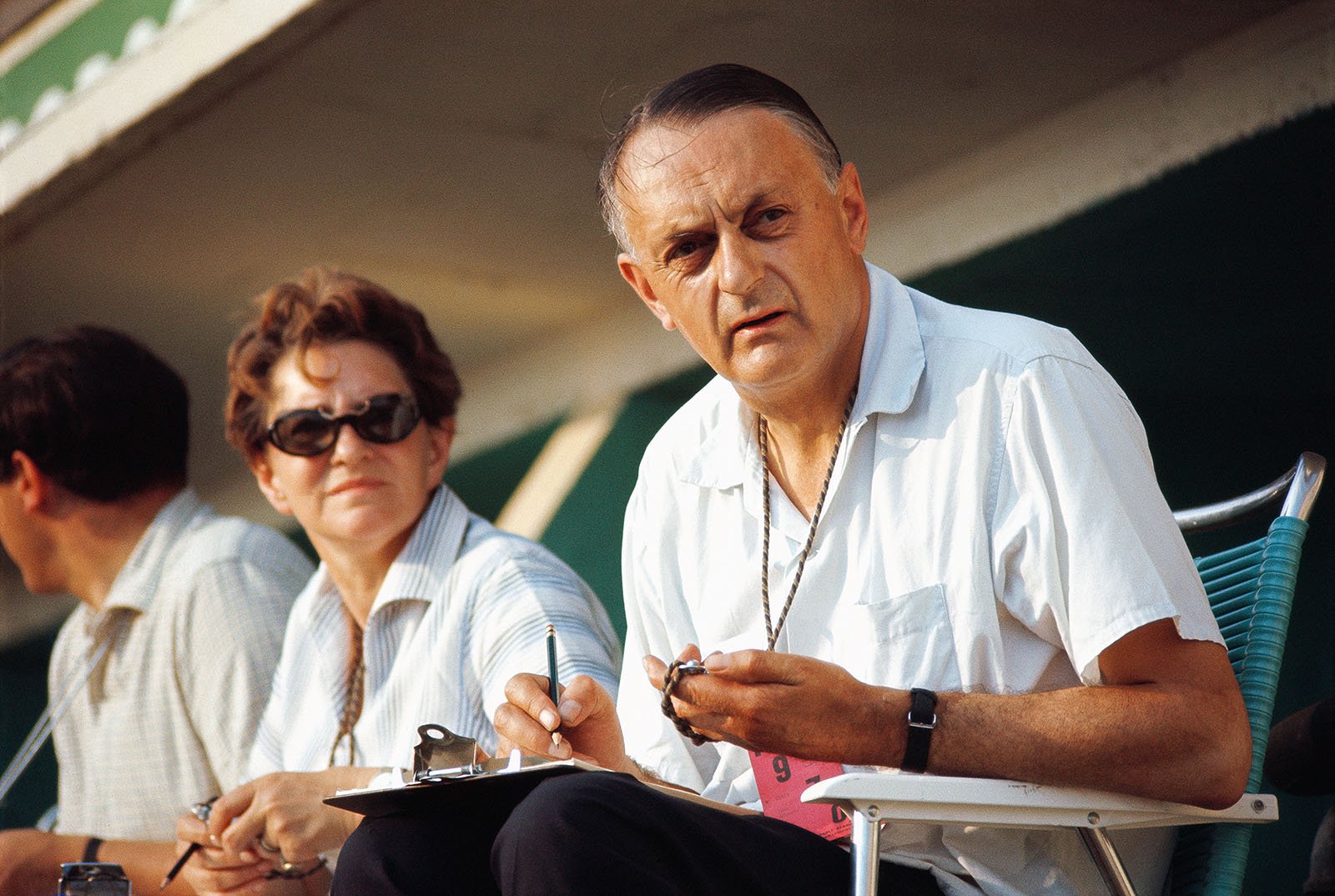 John Wyer keeps times in pits at Le Mans 1970 with his wife