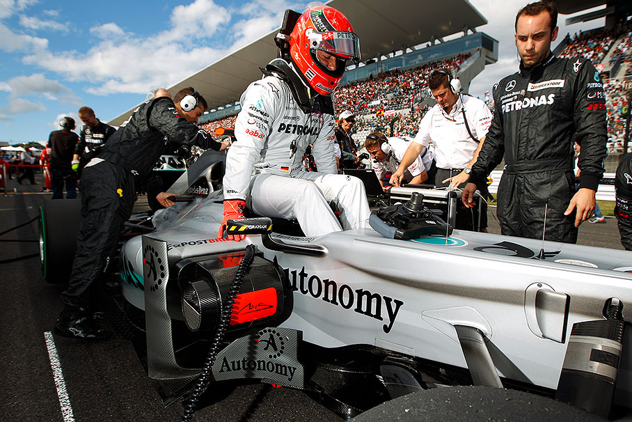 Michael Schumacher before the race on the grid, getting out of the Mercedes car