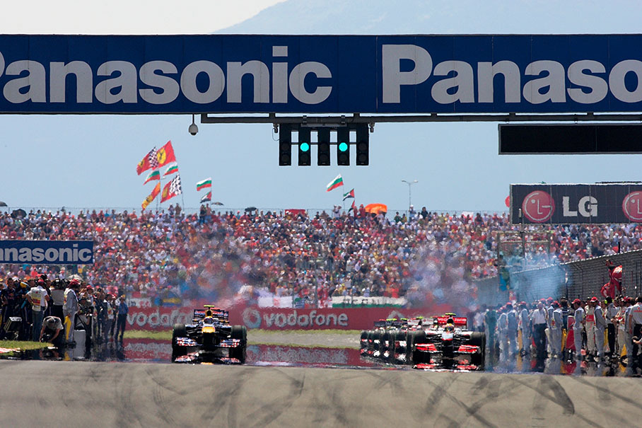 Hot air raises above the grid before the formation lap