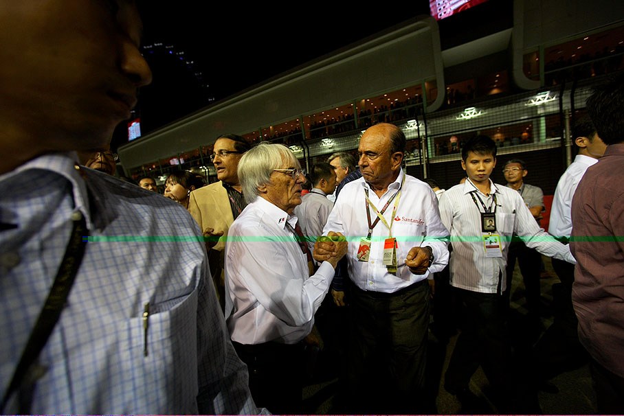 Bernie Eclestone on the grid with Banco Santander's chairman of the board and F1 premium sponsoring partner Emilio Botin