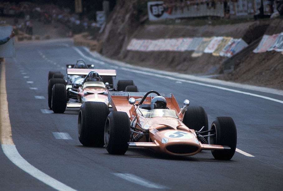 Bruce McLaren on McLaren-Cosworth M7C leads Graham Hill, French GP Clermont-Ferrand 1969