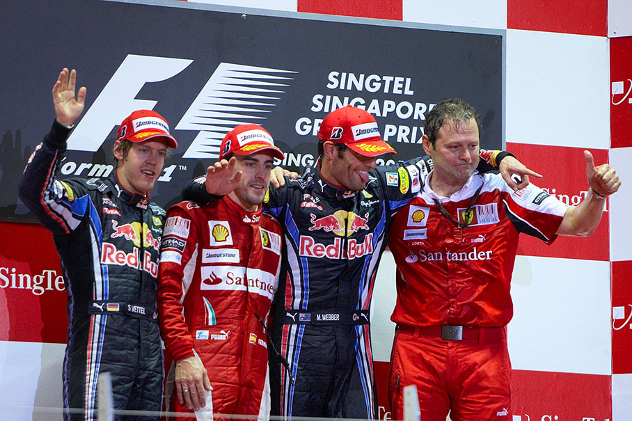 Final podium ceremony group photo of Red Bull's second placed Sebastian Vettel, race winner Fernando Alonso of Ferrari, third placed Mark Webber of Red Bull and Ferrari's technical director Aldo Costa