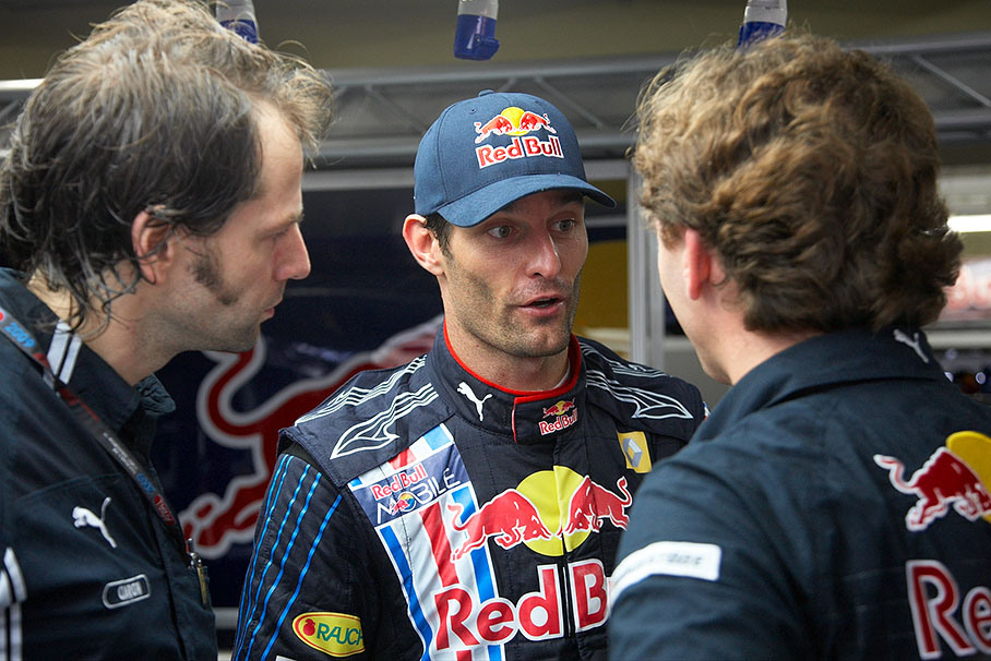 Race winner Mark Webber speaks with Red Bull race engineer Ciaron Pilbeam and team principal Christian Horner
