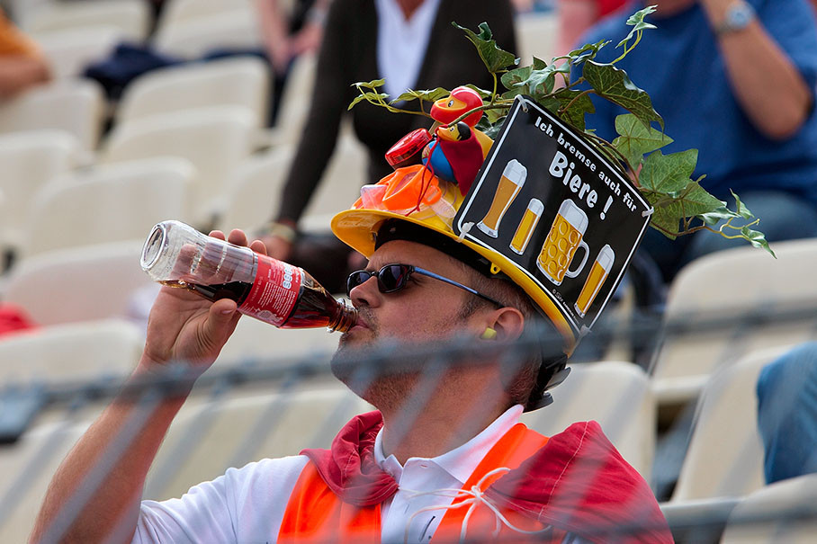 An austrian fan seems to dislike the german beer