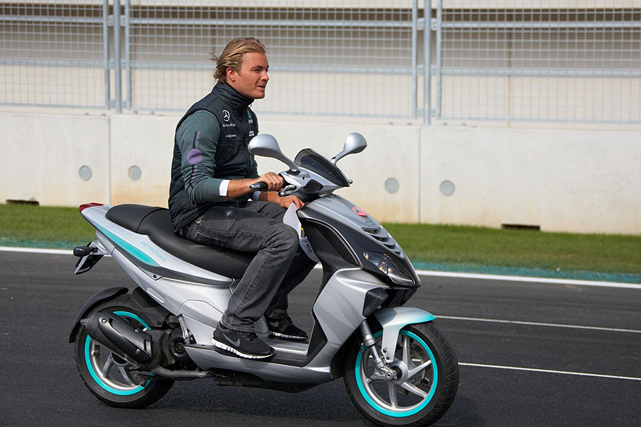 Nico Rosberg checks the new Korean track on a scooter