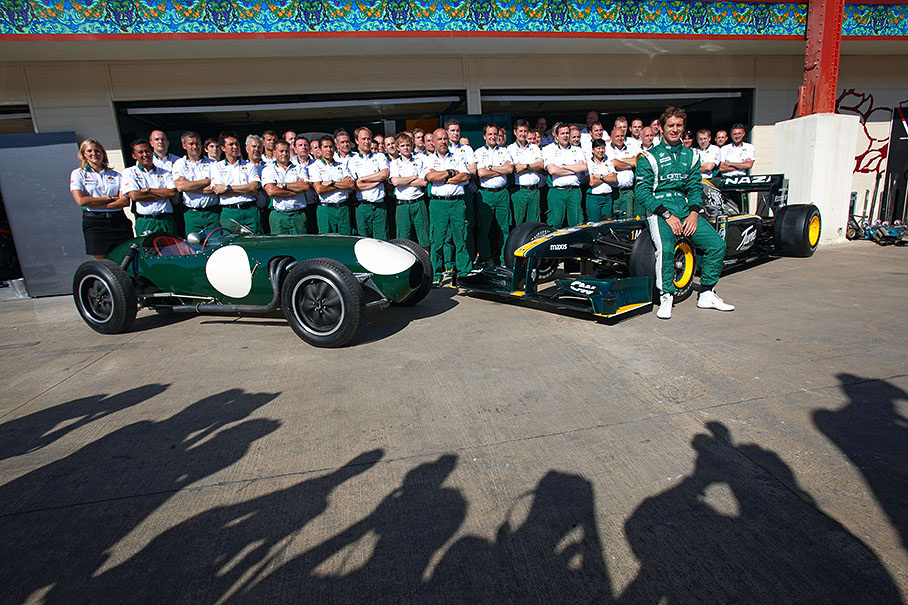 The Lotus Racing F1 Team celebrates Lotus' 500th Grand Prix with a group shot - without Kovalainen who is still stuck on a strikebound French airport