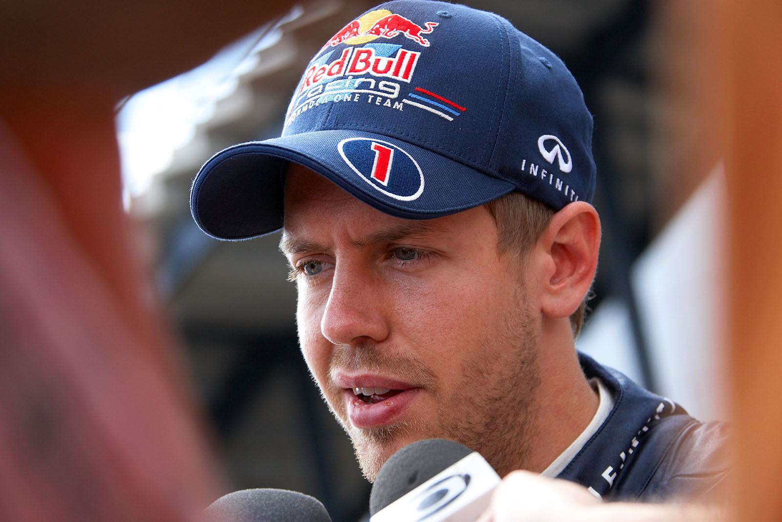 Second placed Sebastian Vettel answers many questions after the race