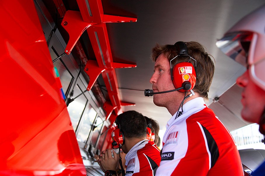 Ferrari race engineer Rob Smedley watches Massa's data screens