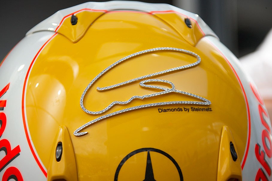 Real diamonds sprinkle on Lewis' helmet