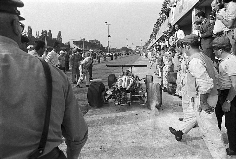 A leading Jacky Ickx on Ferrari has to refuel in pits just a few laps to go and becomes third placed only in the end, Italian GP Monza 1968