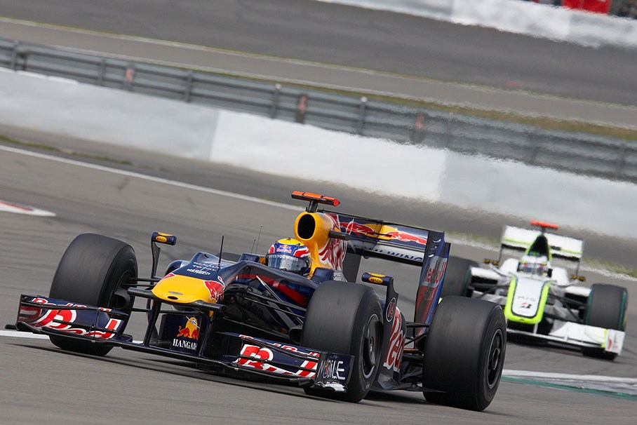 Race winner Mark Webber in front of Rubens Barrichello