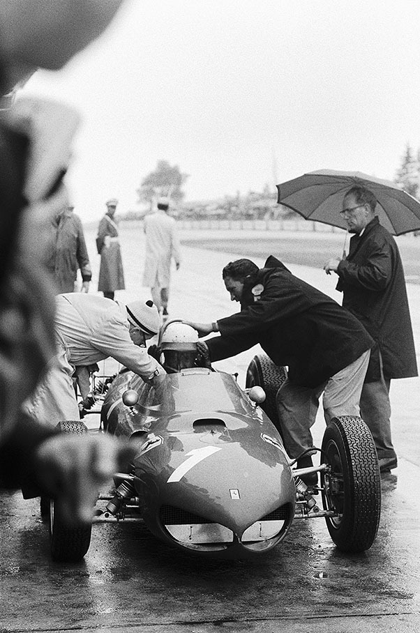 Ferrari's reigning World Champion Phil Hill in the pits