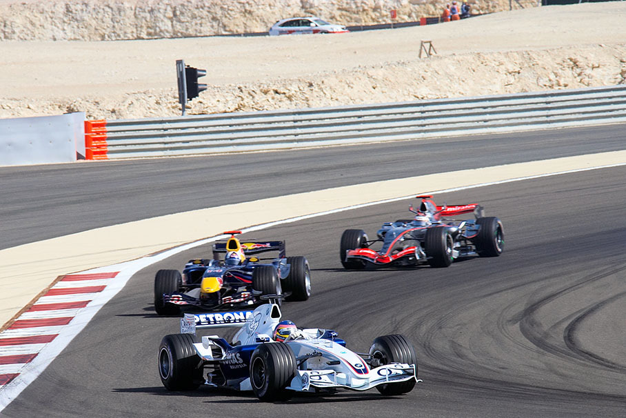 Jacques Villeneuve in front of David Coulthard and Kimi Raikkonen