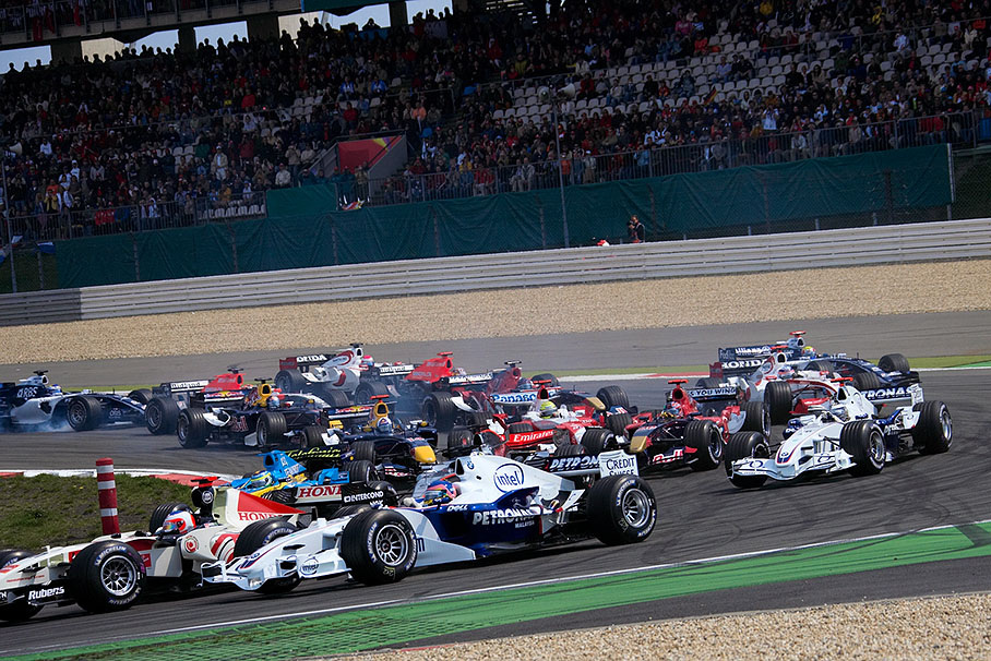 Note Liuzzi being nudged by Ralf Schumacher, suffering of a resulting tire damage in due course