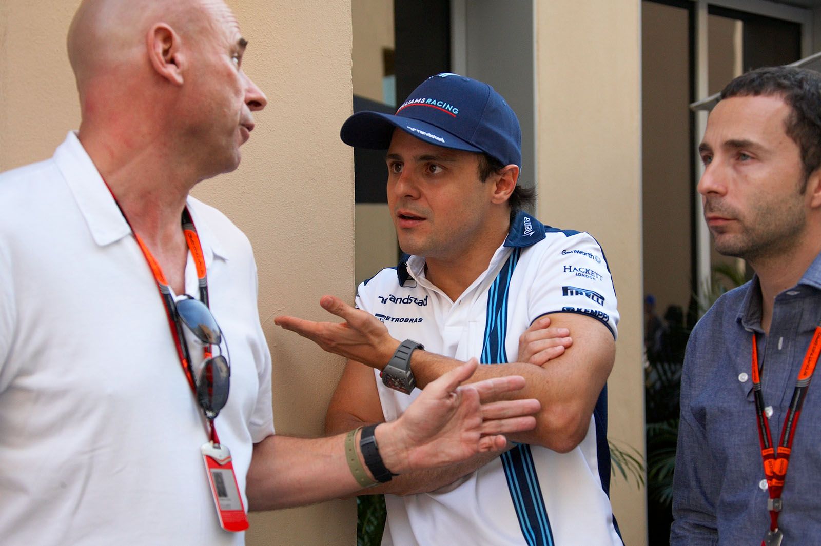 Felipe Massa of Williams with his manager Nicolas Todt (right) and Guy la Liberte from the cirque du soleil, Abu Dhabi Grand Prix, 2015
