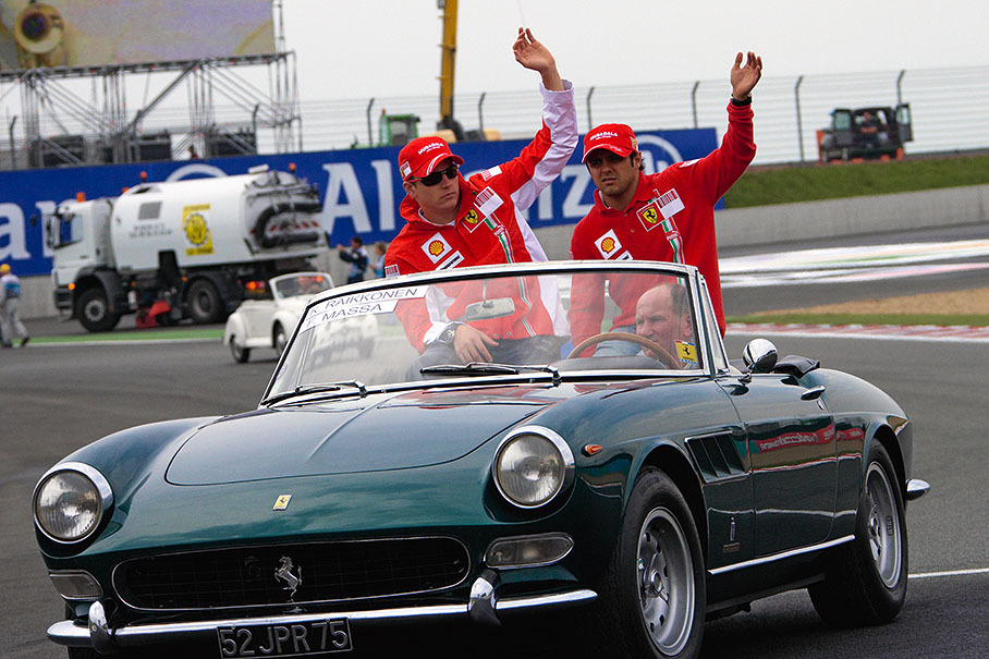 Ferrari drivers Raikkonen and Massa